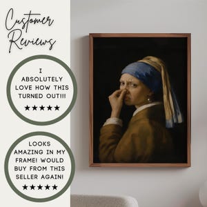 May include: A framed wall art print featuring a parody of the Girl with a Pearl Earring, showing a person with a blue headscarf pinching their nose in disgust. The text reads: Customer Reviews, I ABSOLUTELY LOVE HOW THIS TURNED OUT!!!