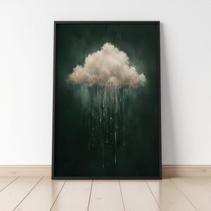 May include: A framed art print depicting a cloud with rain against a dark green backdrop. The cloud is white and beige, with long, vertical white streaks representing rain. The artwork is in a black frame.