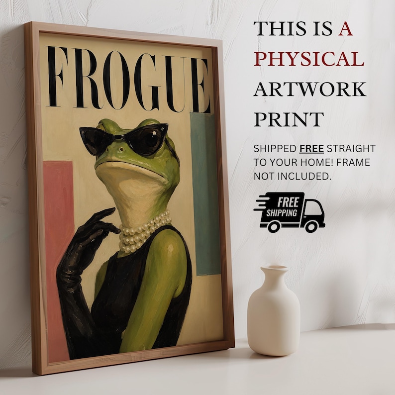 May include: A framed artwork print featuring a green frog wearing black cat-eye sunglasses, a pearl necklace, and a black sleeveless top. The word FROGUE is printed in large black letters at the top. The background includes pink and blue rectangles.