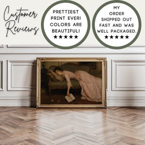 May include: A framed art print featuring a painting of a person in a long pink dress resting on a dark green sofa while holding an open book. The image includes text overlays that read: Customer Reviews, PRETTIEST PRINT EVER! COLORS ARE BEAUTIFUL!, and MY ORDER SHIPPED OUT FAST AND WAS WELL PACKAGED.