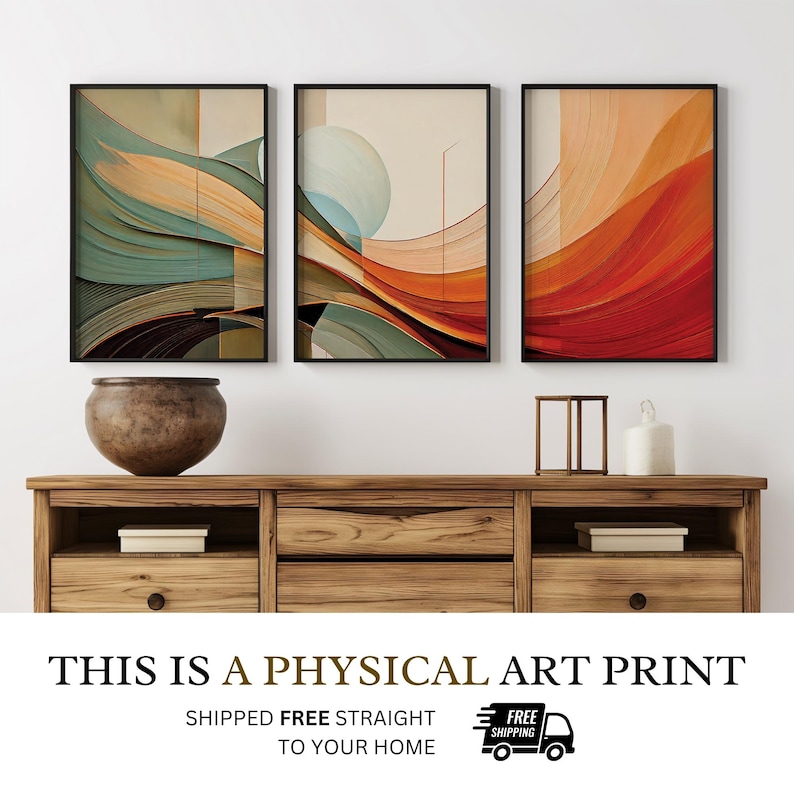 May include: Three framed abstract art prints with a modern design in shades of teal, orange, and brown. The prints are displayed above a wooden cabinet with a decorative vase and candle. The text at the bottom reads "THIS IS A PHYSICAL ART PRINT".