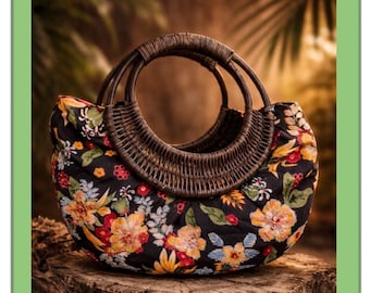 Bolso de mano vintage Braciano negro con estampado floral y cuentas, asa circular de ratán, estilo bohemio.