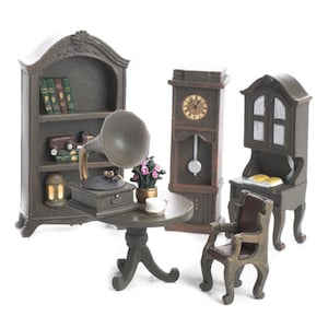 May include: Miniature antique-style furniture set in shades of gray and brown. The set includes a bookshelf, a grandfather clock, a desk, a chair, a round table, and a gramophone. Decorative items include books, flowers, and a teacup.