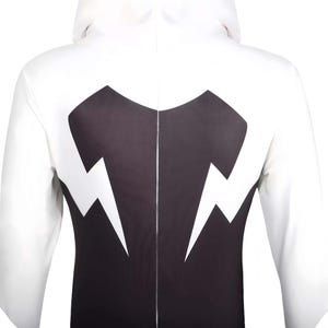 May include: A white hooded long-sleeve shirt featuring a large black graphic panel on the back. The black design includes two prominent white lightning bolt shapes pointing downward on either side of the center seam of the garment.