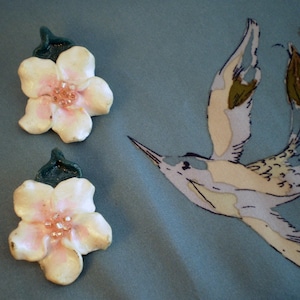 Handmade vintage flower-shaped ear clips