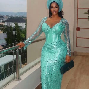 mint green dress on dark skin Prom Feature @airychay (Dress designer @the__fashion_addict_ )