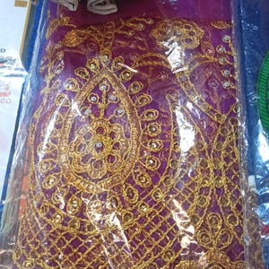 Nigerianisches Meerjungfrauenkleid aus Spitze: Asoebi-Hochzeitsstil Bild 5