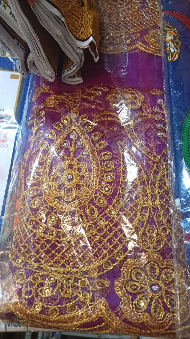Nigerianisches Meerjungfrauenkleid aus Spitze: Asoebi-Hochzeitsstil Bild 5