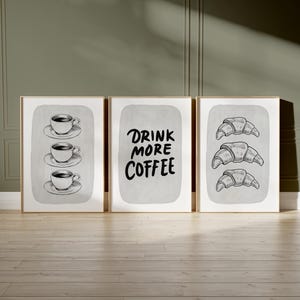 May include: A set of three ceramic mugs with a speckled, matte finish. The mugs are in shades of cream, light gray, and dark gray. Each mug has a simple, minimalist design, perfect for coffee or tea.