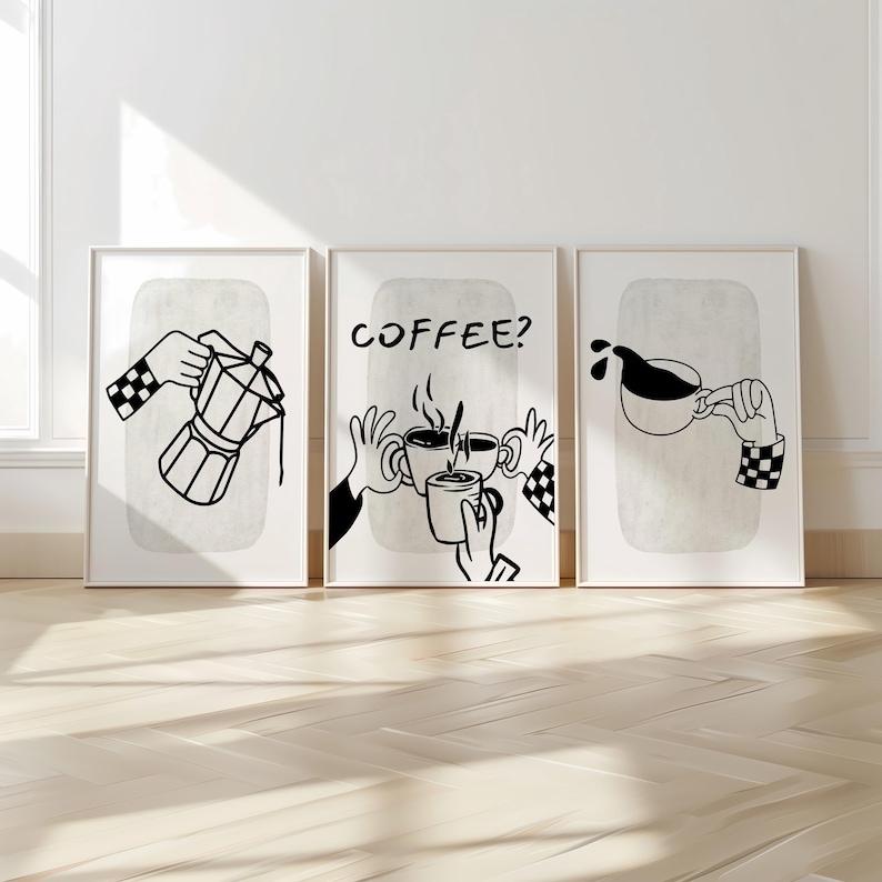 May include: Set of three framed art prints with minimalist coffee-themed illustrations in black and white. One shows a coffee maker, another asks "Coffee?", and the third depicts coffee pouring into a cup. Each print features a neutral background.