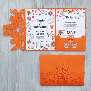 May include: A wedding invitation with a bright orange and white color scheme. The invitation features a floral design and the text "Paulo & Andreanna" and "07 June at 9PM".