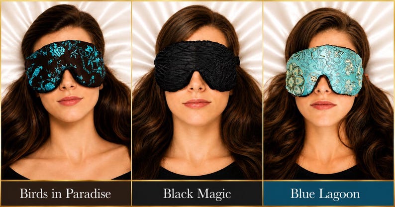 May include: Three sleep masks shown in a row. The first is black with a teal floral and bird pattern labeled Birds in Paradise. The second is solid black with a textured surface labeled Black Magic. The third is teal with a floral pattern labeled Blue Lagoon.