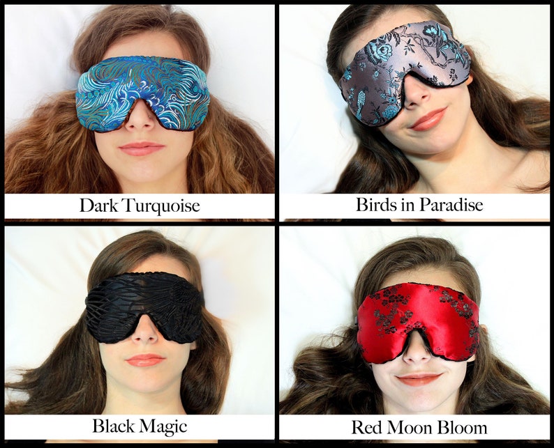 May include: Four eye masks are shown, each with a unique design. The colours are dark turquoise, grey with a floral pattern, black, and red with a floral pattern. Text on the image reads "Dark Turquoise", "Birds in Paradise", "Black Magic", and "Red Moon Bloom".