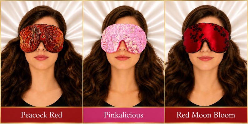 May include: Three sleep masks featuring distinct patterns. The first is a red and orange textured design labeled Peacock Red. The second is a light pink floral pattern labeled Pinkalicious. The third is a red satin mask with black floral details labeled Red Moon Bloom.