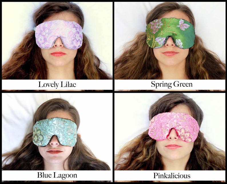 May include: Four eye masks in various colours: Lovely Lilac, Spring Green, Blue Lagoon, and Pinkalicious. Each mask features a unique pattern and is worn by a person. Text below each mask indicates its name.