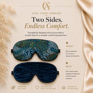 May include: A dual-sided sleep mask featuring a front side with a teal, gold, and white peacock feather pattern on silky satin and a back side made of solid dark blue crushed velvet. The text reads Dual Sided Comfort, Two Sides. Endless Comfort.