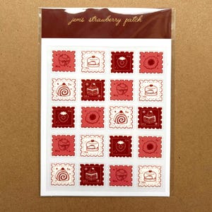 May include: A sheet of stickers with red and white postage stamp designs. The stamps feature illustrations of strawberries, cakes, and pastries. The text "jem's strawberry patch" is at the top. Each stamp has a price printed on it.