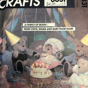 May include: A sewing pattern for making a family of three bears. The pattern is called "A Family of Bears - Make Papa, Mama and Baby Plum Plum." The pattern is from McCall's Crafts and the pattern number is 8831.