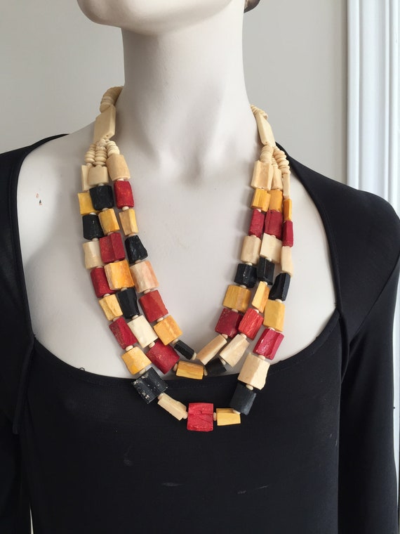 60s Cream/Yellow/Red/Black Tribal Unique Carved B… - image 1