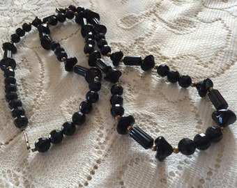 80ss  Mixed shapes black plastic beads 34 inches opera necklace vintage