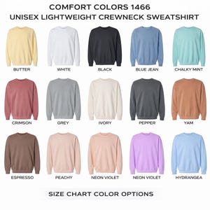 May include: A display of Comfort Colors 1466 unisex lightweight crewneck sweatshirts in various colors, including Butter, White, Black, Blue Jean, and Chalky Mint. The image also shows Crimson, Grey, Ivory, Pepper, Yam, Espresso, Peachy, Neon Violet, and Hydrangea.