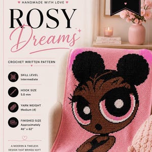 May include: A pink crochet blanket featuring a cartoon character design with black hair and large eyes. The blanket measures approximately 46" x 62". The image also includes text that reads "Rosy Dreams" and "Crochet by Sha".