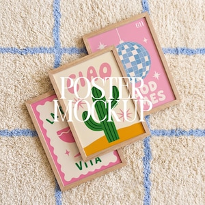 May include: Three rectangular posters in light wood frames. One features a blue disco ball on a pink background with the text 611. Another shows a green cactus on a cream background with the text CIAO. The third displays a pink drink with the text LA VITA.