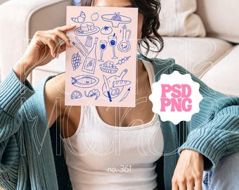 May include: A pink poster with blue line art illustrations of food items, including a croissant, cheese, pasta, tomatoes, wine, and fish. The text "no. 361" is at the bottom. A white tank top and blue sweater are visible.
