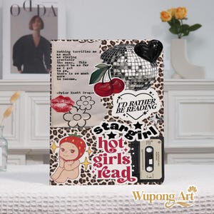 May include: A decorative art piece with a collage design. It features a leopard print background, a disco ball, cherries, a cassette tape, and the text "hot girls read." Additional text includes "I'd rather be reading."