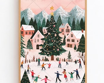 May include: A framed winter scene print depicts a festive village with a decorated Christmas tree, snow-covered houses, and people ice skating. The artwork features a color palette of pink, green, and white, with a gold star atop the tree and snow-capped mountains in the background.