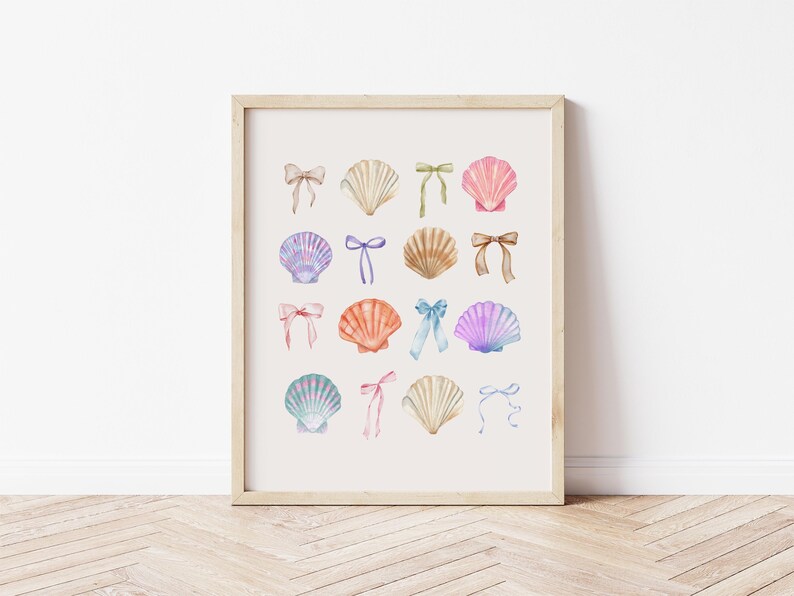 May include: A watercolour print featuring a collection of seashells in pastel pink, blue, and purple hues. Each seashell is adorned with a delicate bow in various shades of pink, blue, and green.