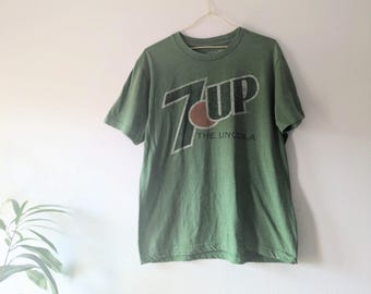 Vintage 7 up t shirt, medium sized green and orange t shirt with short sleeves, 90s  retro clothing merchandise gift for collector