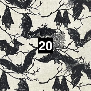 May include: A black and white fabric with a repeating pattern of bats hanging from branches. The fabric has a textured, linen-like appearance. The number "20" is printed in white on a black square in the center of the image.