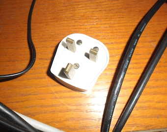british 3-prong electric plug (originally from Singer 222K)