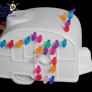 Ceramic camper UNPAINTED with light kit and multicolored twist lights.