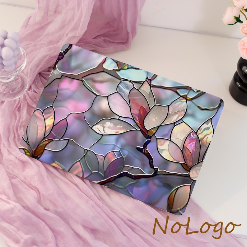 May include: A laptop case with a stained-glass design featuring large, stylized magnolia flowers in shades of pink, purple, and blue. The design has a pearlescent sheen. The text "NoLogo" is in the bottom right corner.