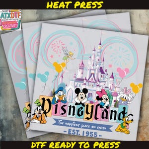 May include: A colorful digital design featuring Mickey Mouse, Minnie Mouse, Donald Duck, Goofy, and Tinkerbell in front of Sleeping Beauty's Castle. The text "Disneyland" is written in a whimsical font with the words "The Happiest Place on Earth" and "EST. 1955" below. The design is ready to be pressed onto a t-shirt or other fabric using a heat press.