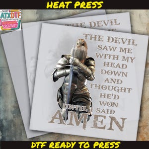 May include: A digital design featuring a woman in armor kneeling with a sword. The text reads "The Devil Saw Me With My Head Down And Thought He'd Won Until I Said Amen".