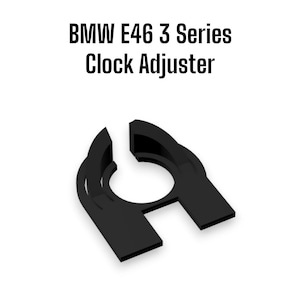 May include: A black clock adjuster for a BMW E46 3 Series vehicle. The text "BMW E46 3 Series Clock Adjuster" is printed in black above the part. The adjuster has a circular opening and two rectangular extensions.