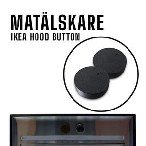 Könnte beinhalten: Schwarze Matälskare IKEA Dunstabzugshauben-Knöpfe. Das Bild zeigt zwei runde schwarze Knöpfe in einem weißen Kreis, mit dem Text "MATÄLSKARE IKEA HOOD BUTTON" darüber. Die Knöpfe sind für eine IKEA Dunstabzugshaube.