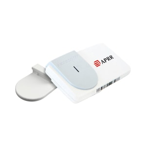 May include: A white rectangular device with a light grey top and a white, curved extension. The device has the text "kapsch" and "APRR" printed on it, along with a barcode. The top has a black line.