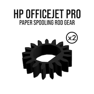 Peut inclure: Engrenage noir pour imprimantes HP OfficeJet Pro. L'image montre un engrenage noir avec plusieurs dents, étiqueté comme engrenage de tige d'enroulement du papier. L'image indique également qu'il y a deux engrenages inclus.