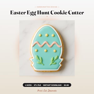 May include: An egg-shaped cookie decorated with light blue icing, featuring a horizontal wavy pink line, yellow dots, and green leaf-like accents. The text 'Easter Egg Hunt Cookie Cutter' is displayed above, with 'Print. Cut. Decorate.' below.