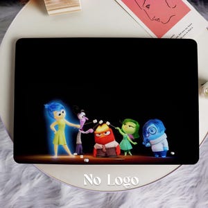 May include: A laptop skin with a black background and a scene from the movie Inside Out. The characters Joy, Sadness, Fear, Disgust, and Anger are depicted in a cartoon style. Joy is blue and glowing, Sadness is blue, Fear is purple, Disgust is green, and Anger is red. The characters are standing in front of a campfire and holding marshmallows on sticks. The text 'No Logo' is printed below the image.