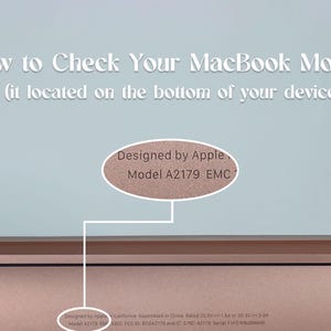 May include: Close up of the bottom of a rose gold MacBook with the text 'Designed by Apple' and 'Model A2179 EMC' visible.