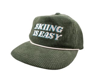 El gorro de pana "Esquiar es fácil" (verde)