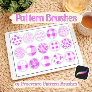 May include: A digital tablet displays 15 circular pattern brush designs in shades of pink and white. The text "Pattern Brushes" and "29 Procreate Pattern Brushes" are displayed. A Procreate app icon is in the bottom right corner.