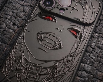 May include: A matte black smartphone case featuring a raised, engraved illustration of a character with sharp fangs and bright red eyes. The design includes a spiked collar, chains, and cross symbols, with the camera lenses integrated into the top.