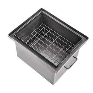 May include: A stainless steel rectangular container with a wire mesh grate inside. The container has a handle on the side.