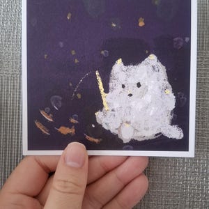 Cartão postal do sonho do gato pescador